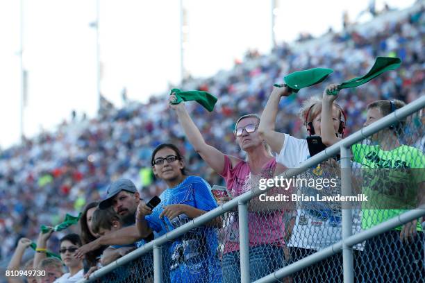 Fans cheer during the Monster Energy NASCAR Cup Series Quaker State 400 presented by Advance Auto Parts at Kentucky Speedway on July 8, 2017 in...