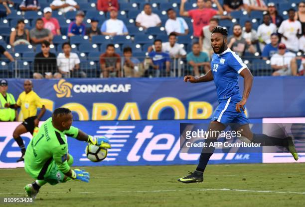 Nicaragua's goalkeeper Justo Llorente saves a shot by Martinique's Yoann Arquin during a Concacaf Gold Cup Group B match in Nashville, Tennessee, on...
