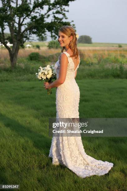 In this handout image provided by the White House, Jenna Bush poses for a photographer prior to her wedding to Henry Hager at Prairie Chapel Ranch...