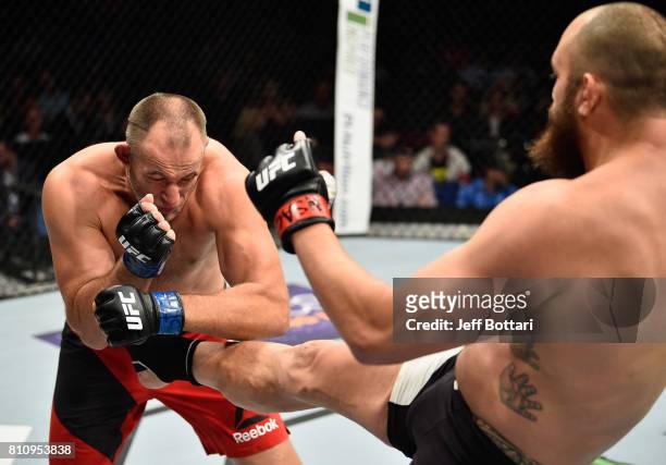 Travis Browne kicks Aleksei Oleinik of Russia in their heavyweight bout during the UFC 213 event at T-Mobile Arena on July 8, 2017 in Las Vegas,...