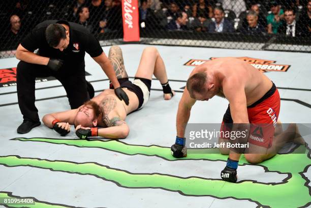 Aleksei Oleinik of Russia celebrates his submission victory over Travis Browne in their heavyweight bout during the UFC 213 event at T-Mobile Arena...