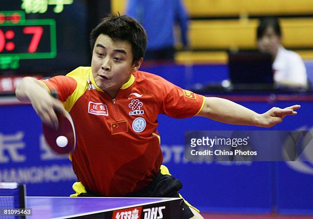 Wang Hao of China returns a shot against Yang Zi of Singapore during the Men's Team Competition of the 2008 ITTF China Table Tennis Open at the...