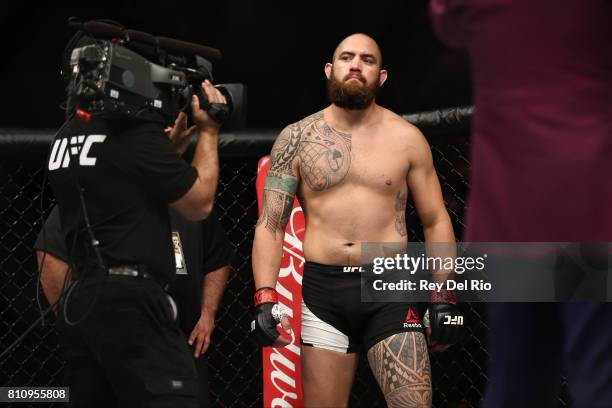 Travis Browne stands in the Octagon prior to his lightweight bout against Aleksei Oleinik in their heavyweight bout during the UFC 213 event at...