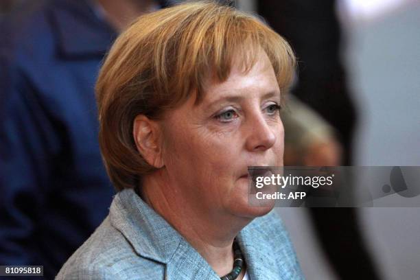 German Chancellor Angela Merkel visits the VW plant, on May 15 in Sao Bernardo do Campo, southern Sao Paulo, Brazil. Merkel is finishing a three-day...