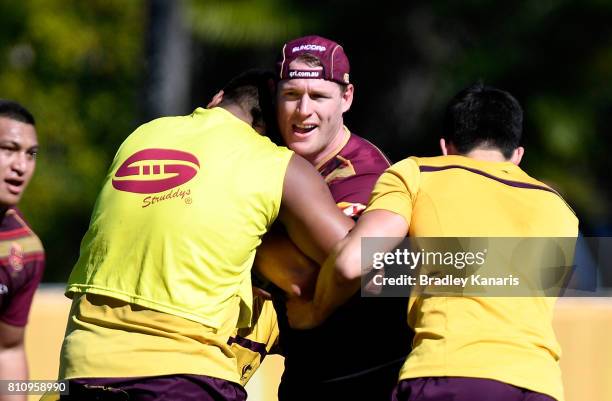 Tim Glasby takes on the defence during a Queensland Maroons State of Origin training session at Sanctuary Cove on July 9, 2017 in Brisbane, Australia.
