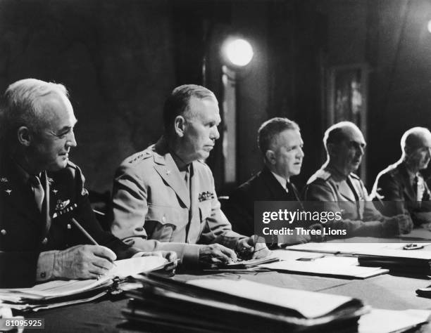 Military leaders attend an Allied conference in North Africa during World War II, circa 1943. From left to right, General Henry H. Arnold , General...