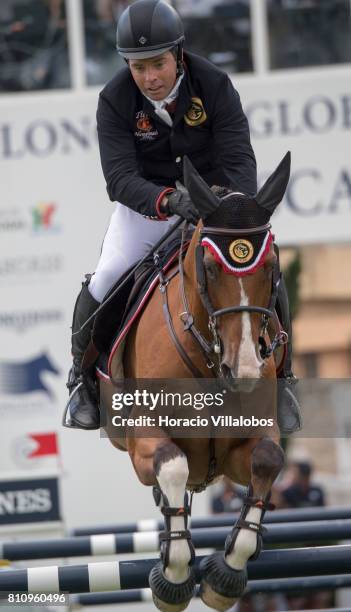 Cian O'Connor of Ireland and horse Super Sox during the CSI5 Global Champions League of Cascais Final against the clock team and individual jumping...