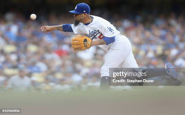 Reliever Sergio Romo of the Los Angeles Dodgers throws a pitch in the eighth inning against the Kansas City Royals at Dodger Stadium on July 8, 2017...