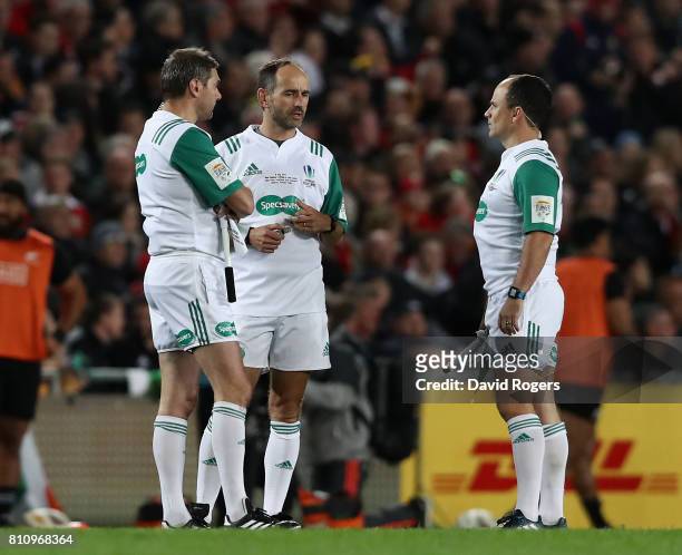 Romain Poite the referee talks to his assistants Jerome Garces and Jaco Peyper during the Test match between the New Zealand All Blacks and the...