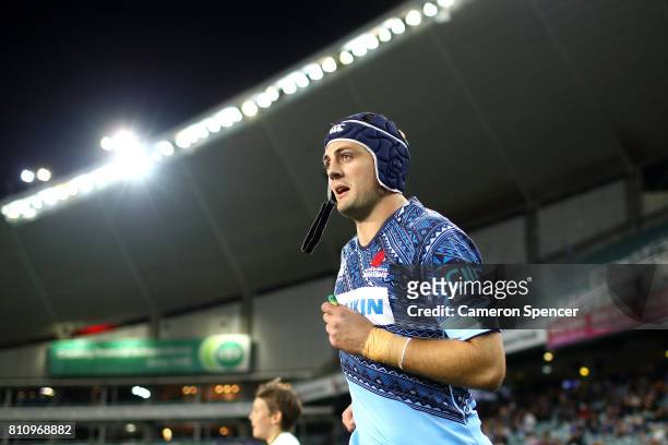 Dean Mumm of the Waratahs runs onto the field for his final home match during the round 16 Super Rugby match between the Waratahs and the Jaguares at...