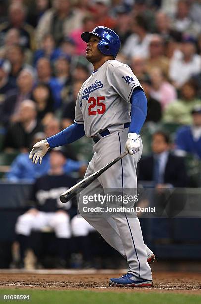 Andruw Jones of the Los Angeles Dodgers watches the flight of his solo home run in the 7th inning against the Milwaukee Brewers on May 15, 2008 at...