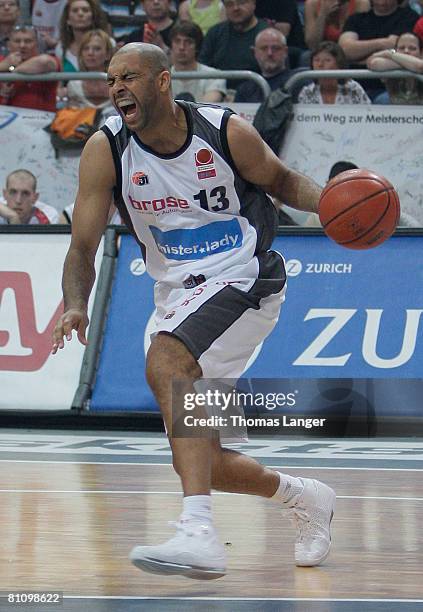 Ademola Okulaja of Bamberg in action during the Basketball Bundesliga quarter final play-off match between Brose Baskets Bamberg and EWE Baskets...