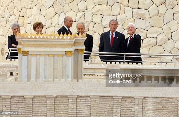 First Lady Laura Bush, , Israeli Prime Minister Ehud Olmert and U.S. President George W. Bush walk around at a reception at the Israel Museum May 15,...
