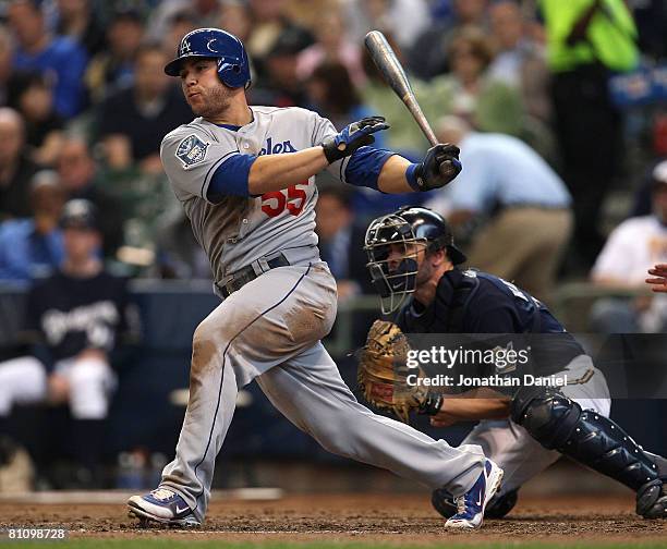 Russell Martin of the Los Angeles Dodgers hits a run-scoring single in the 7th inning against the Milwaukee Brewers on May 15, 2008 at Miller Park in...