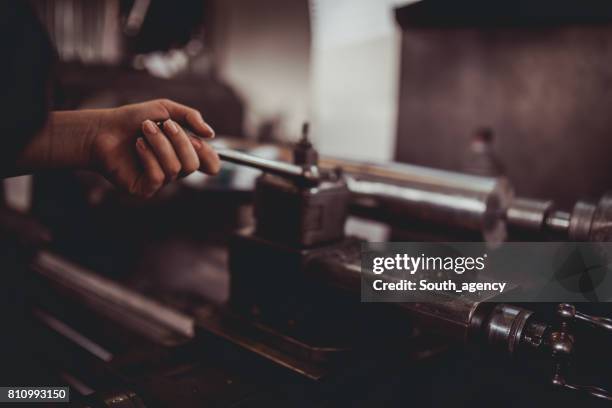 working on a drill machine - parts of a milling machine stock pictures, royalty-free photos & images