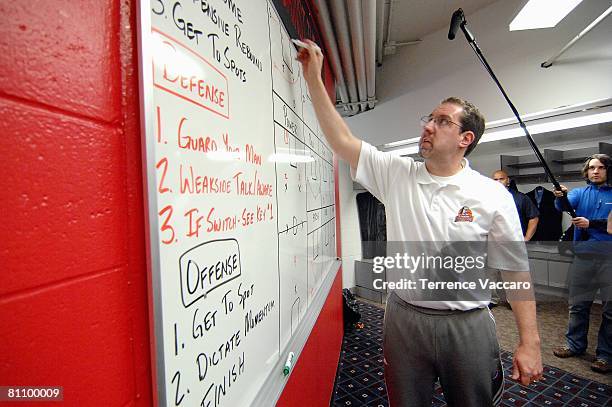 Head coach Bryan Gates of the Idaho Stampede goes over strategy before the game against the Austin Toros in Game Two of the D-League Finals on April...