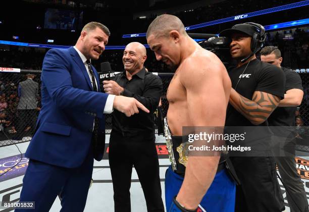 Middleweight champion Michael Bisping challenges newly crowned interim UFC middleweight champion Robert Whittaker of New Zealand after his victory...