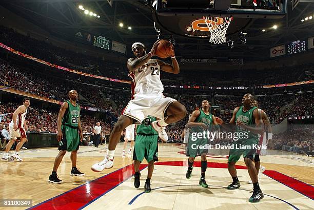 LeBron James of the Cleveland Cavaliers grabs a rebound in Game Four of the Eastern Conference Semifinals against the Boston Celtics during the 2008...