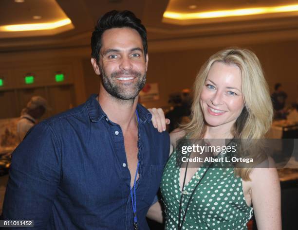 Actor Jason Shane Scott and actress Jessica Morris sign autographs at The Hollywood Show held at Westin LAX Hotel on July 8, 2017 in Los Angeles,...