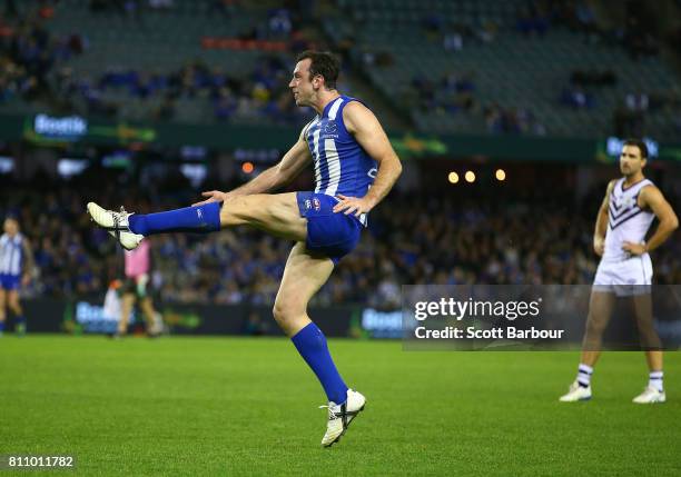 Todd Goldstein of the Kangaroos misses a shot at goal in the the final minute during the round 16 AFL match between the North Melbourne Kangaroos and...