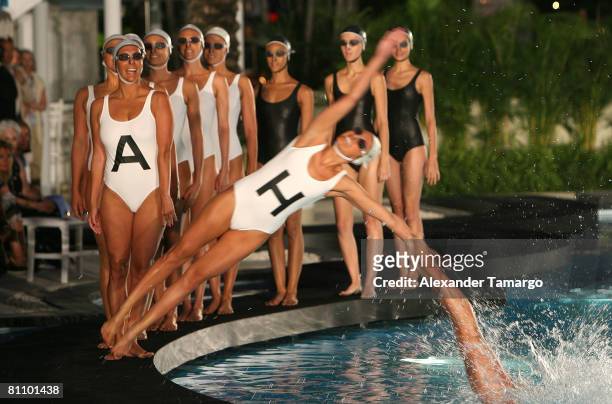 Models walk the runway during the CHANEL 2008/09 Cruise Show at the Raleigh Hotel on May 15, 2008 in Miami, Florida.