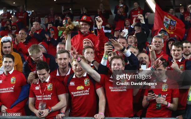 Lions supporters celebrate during the Test match between the New Zealand All Blacks and the British & Irish Lions at Eden Park on July 8, 2017 in...