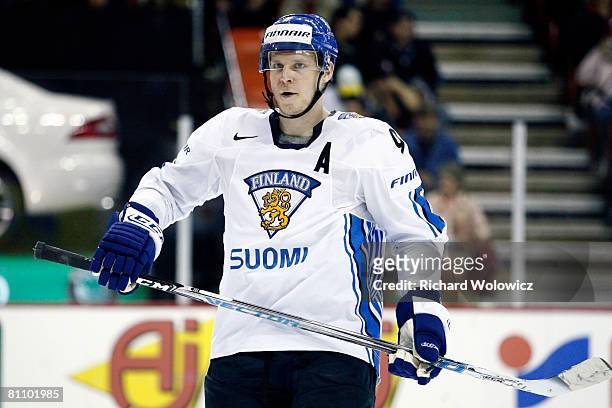 Mikko Koivu of Finland prepares for a faceoff during the game against the United States at the IIHF World Ice Hockey Championship qualification round...