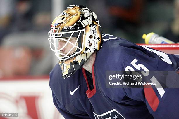 Robert Esche of the United States watches play during the game against Finland at the IIHF World Ice Hockey Championship qualification round at the...