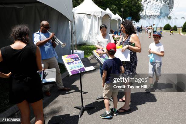 Atmosphere and activities for children and adults during the 2017 Louis Armstrong's Wonderful World Festival at Flushing Meadows Corona Park on July...