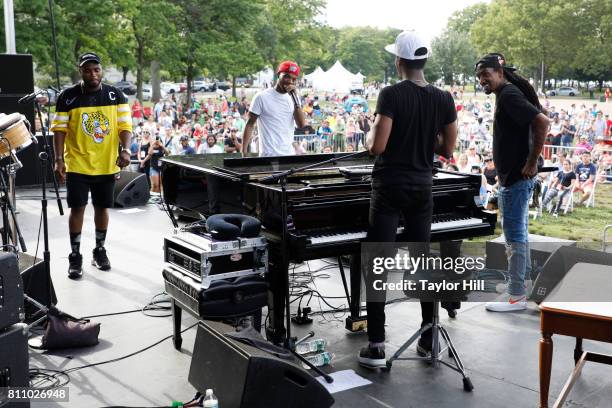 Jon Batiste performs with Avenue, Kris Kasanova, and Don Flamingo during the 2017 Louis Armstrong's Wonderful World Festival at Flushing Meadows...