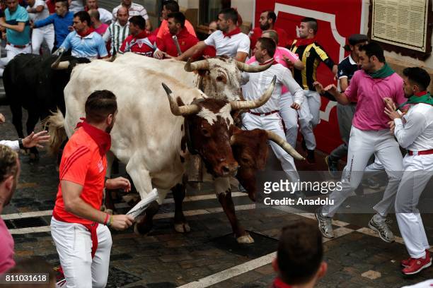 People take part in varied activities after the "Encierro", Running of the Bulls within the San Fermin Festival held in Pamplona, Spain on July 09,...