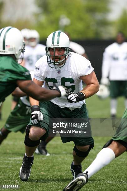 Guard Alan Faneca of the New York Jets blocks during Organized Team Activities at the team's facilities May 15, 2008 in Hempstead, New York.