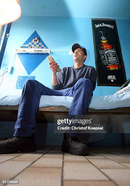 Prisoner Atif watches television in his prison cell at the Iserlohn prison on May 15, 2008 in Iserlohn, Germany. The prison in North Rhine-Westphalia...