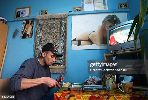 Prisoner Atif eats his lunch in his prison cell at the Iserlohn prison on May 15, 2008 in Iserlohn, Germany. The prison in North Rhine-Westphalia...