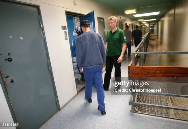 Prisoner Atif walks into his prison cell at the Iserlohn prison on May 15, 2008 in Iserlohn, Germany. The prison in North Rhine-Westphalia inhabits...