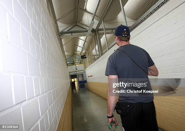 Justice officer Ingo Siebert walks in the corridor at the Iserlohn prison on May 15, 2008 in Iserlohn, Germany. The prison in North Rhine-Westphalia...