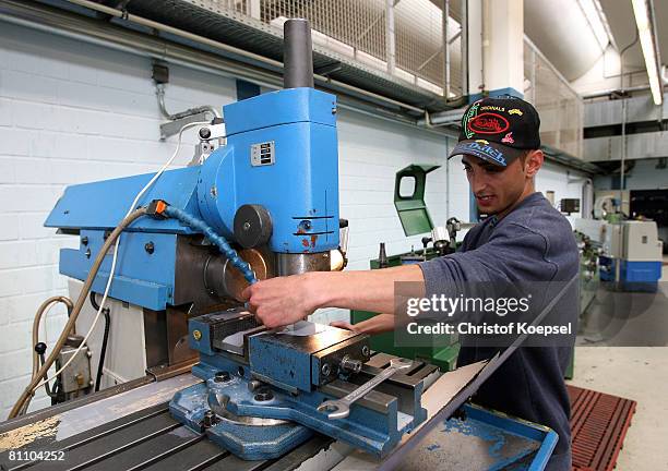 Prisoner Atif works to be a professional machinist at the Iserlohn prison on May 15, 2008 in Iserlohn, Germany. The prison in North Rhine-Westphalia...