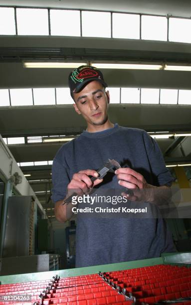 Prisoner Atif works to be a professional machinist at the Iserlohn prison on May 15, 2008 in Iserlohn, Germany. The prison in North Rhine-Westphalia...