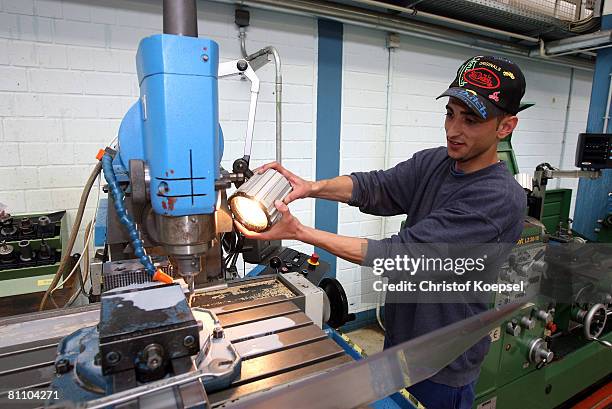 Prisoner Ati fworks to be a professional machinist at the Iserlohn prison on May 15, 2008 in Iserlohn, Germany. The prison in North Rhine-Westphalia...