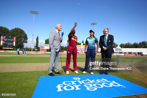 Stafanie Taylor of West Indies tosses the coin alongside Inoka Ranaweera of Sri Lanka during the ICC Women's World Cup match between West Indies and...
