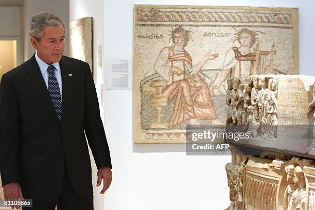 President George W. Bush and First Lady Laura Bush tour the Bible Lands Museum on May 16, 2008 in Jerusalem. Facing dismally low approval ratings at...