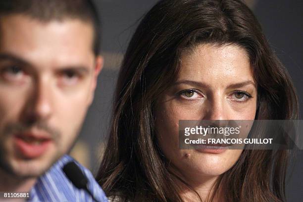 French actress Chiara Mastroianni listens to questions as French actor Melvil Poupaud speaks during a press conference after a photocall for French...