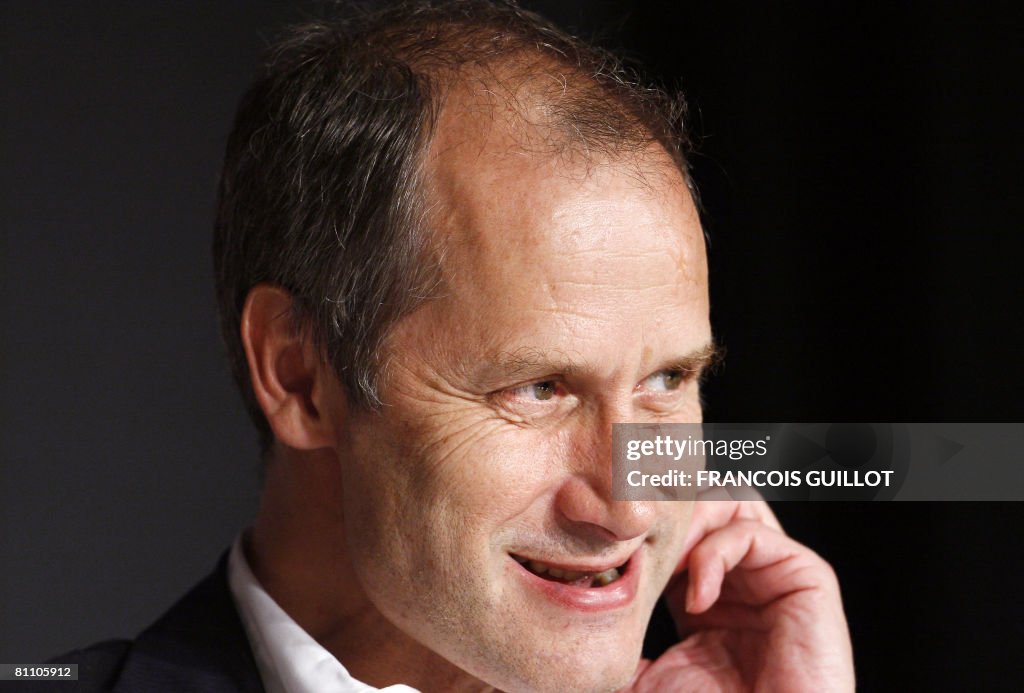 French Hippolyte Girardot listens to qu