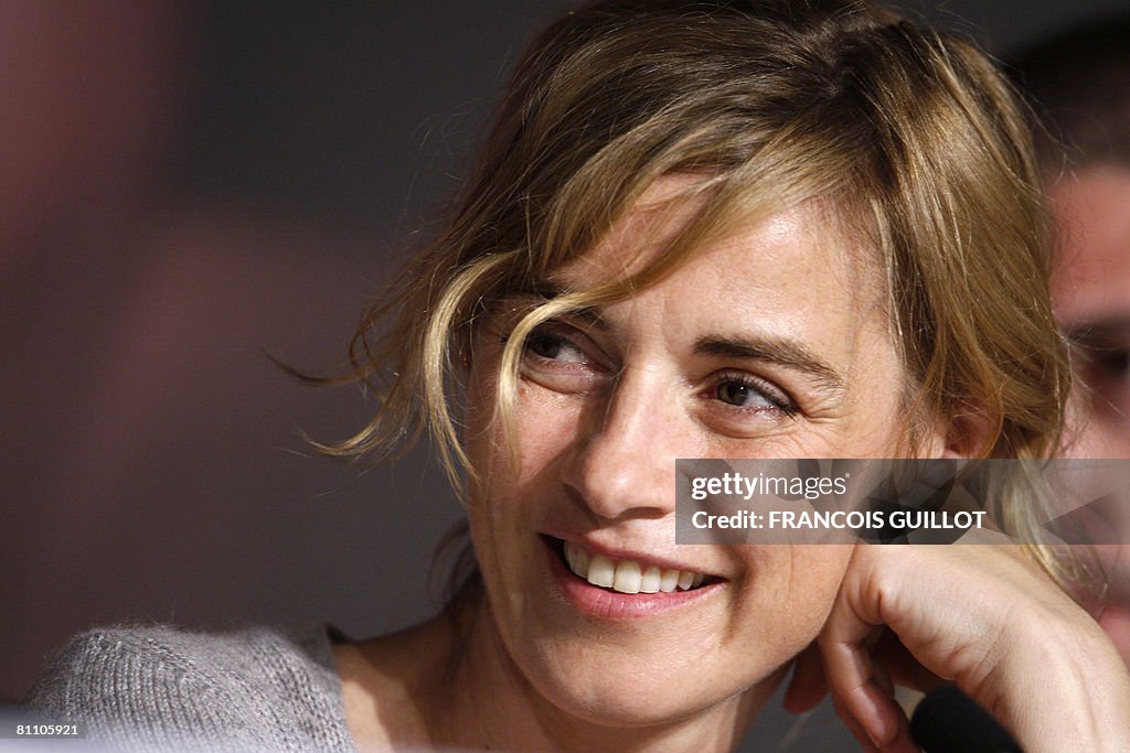 French actress Anne Consigny  listens to