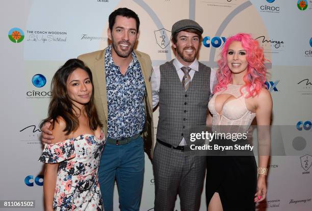 Linda Phan, television personalities Drew Scott and J.D. Scott and model Annalee Belle arrive at the Coach Woodson Las Vegas Invitational red carpet...