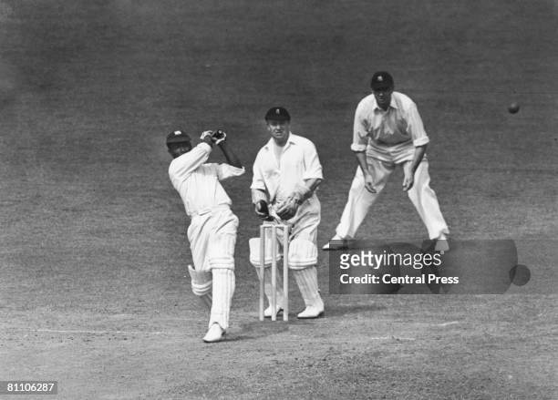 West Indies cricketer George Headley batting against England in the Test Match at The Oval, London, 1939. At the wicket is Arthur Wood , and at the...