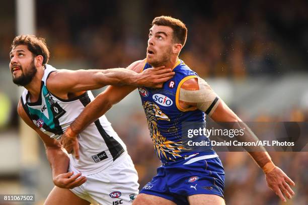 Scott Lycett of the Eagles contests a boundary throw in against Paddy Ryder of the Power during the 2017 AFL round 16 match between the West Coast...