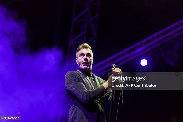 James Copley of French band Electro Deluxe performs during the 24th edition of the Cognac Blues festival in Cognac on July 8, 2017. / AFP PHOTO /...