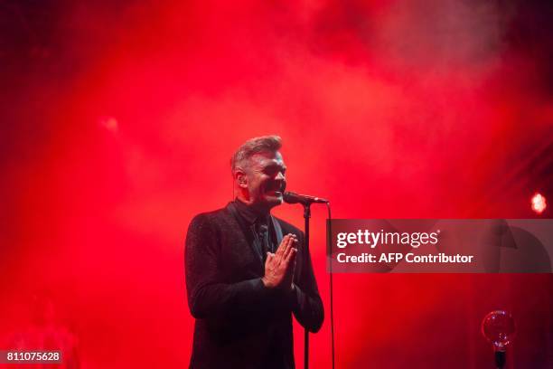 James Copley of French band Electro Deluxe performs during the 24th edition of the Cognac Blues festival in Cognac on July 8, 2017. / AFP PHOTO /...