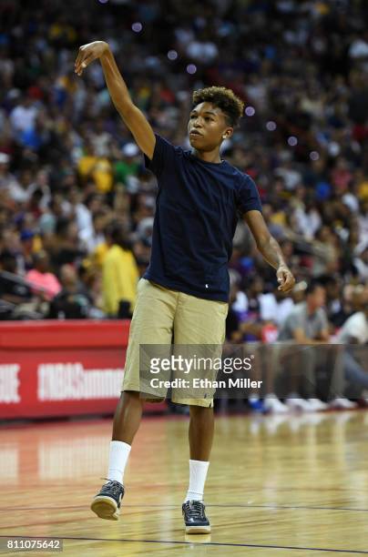 Koraun Mayweather, son of boxer Floyd Mayweather Jr., shoots baskets as part of a promotion during a timeout in a 2017 Summer League game between the...